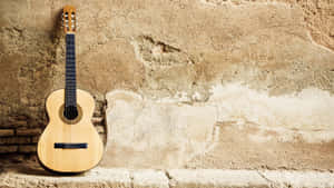 Classical Guitar Against Wall H D Wallpaper