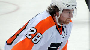 Claude Giroux Of The Ottawa Senators In Action Wallpaper