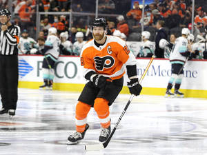 Claude Giroux Skating National Hockey League Wallpaper