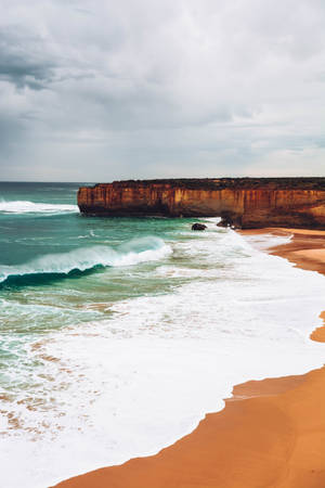 Cliff On Beach Android Wallpaper