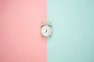 Clock On Pastel Backdrop Wallpaper