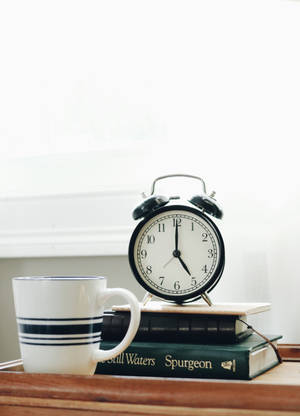 Clock On Top Of Books Wallpaper