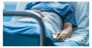 Close-up Of A Patient In Hospital Bed Wallpaper