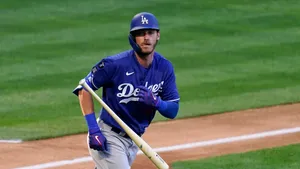 Cody Bellinger Running In Field Wallpaper