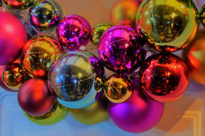 Colorful Christmas Balls For Holiday Season Wallpaper