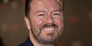 Comedian Ricky Gervais Performing On Stage