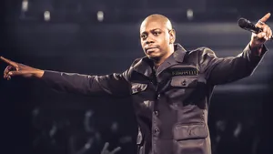 Comedy King Dave Chappelle Performing Live Wallpaper