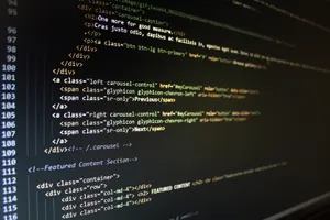 Computer Screen With Colorful Code Wallpaper