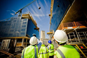 Construction Workers Looking Up At Crane Wallpaper