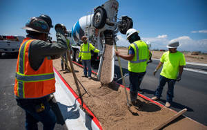 Construction Workers Pouring Cement Wallpaper