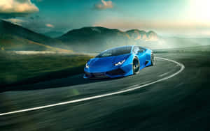 Cool Blue Lamborghini Huracan On The Road Wallpaper