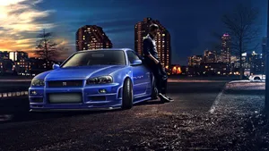 Cool Nissan Skyline With A Man Leaning On Its Side Wallpaper