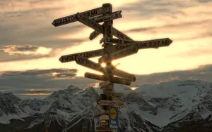 Cool Tablet With Directional Arrow Sign Wallpaper