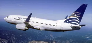 Copa Airlines Plane Above Mountain Peak Wallpaper