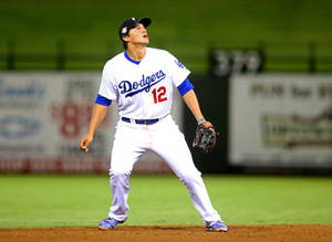 Corey Seager Looking Up And Bracing Himself Wallpaper