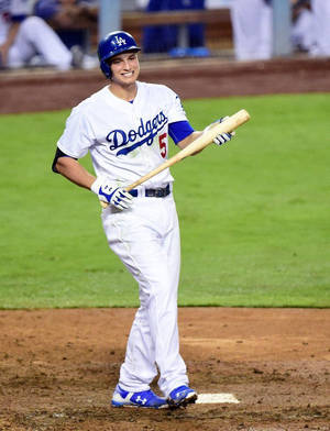 Corey Seager Walking With Baseball Bat Wallpaper