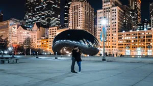 Couple Hug At Cloud Gate In Millennium Park Wallpaper