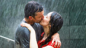 Couple Kissing Each Lips While Raining Wallpaper