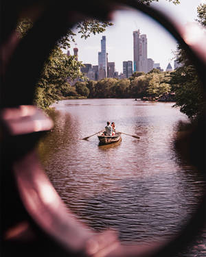 Couple On Boat In Central Park Wallpaper