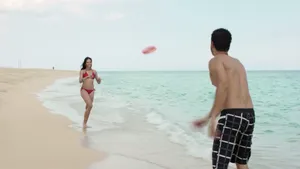 Couple Playing Ultimate Frisbee Wallpaper