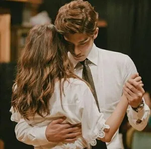 Couple Showing Sweet Affection To Each Other Wallpaper