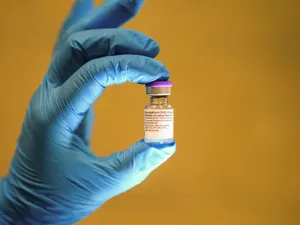 Covid-19 Vaccine Vial In Stratford, England Wallpaper