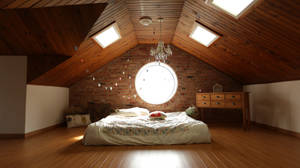 Cozy Attic Bedroom Design Wallpaper