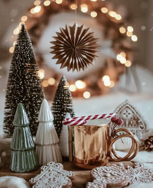 Cozy Christmas Aesthetic Golden Cup Wallpaper