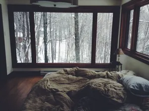 Cozy Winter Day In Bed Wallpaper