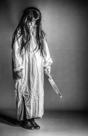 Crazy Scary Girl With Knife Wallpaper