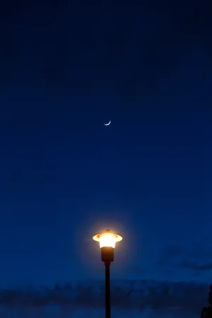 Crescent Moon In Blue Sky Wallpaper