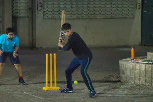 Cricket Players In The Street Wallpaper