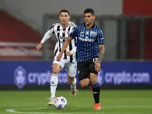 Cristian Romero Leading The Opposing Player Wallpaper