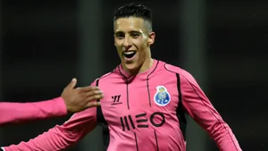 Cristian Tello Celebratingin Pink Jersey Wallpaper