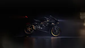 Cruise The Open Road On A Motorcycle Wallpaper