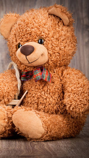 Cuddly Shaggy Brown Teddy Bear Wallpaper