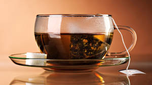 Cup With Tea Bag Wallpaper