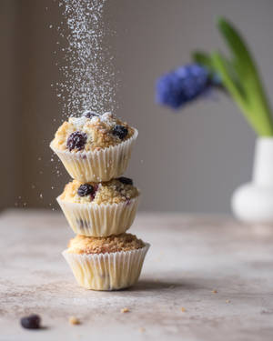 Cupcake With White Icing On Top Wallpaper