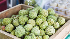 Custard Apples On Wooden Box Wallpaper