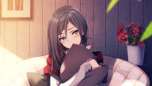 Cute Anime Girl Sitting On Sofa Wallpaper