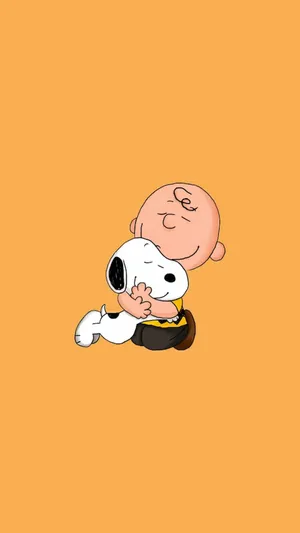 Cute Charlie Brown Hugging Snoopy Wallpaper