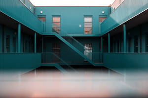 Cyan Apartment Building Wallpaper