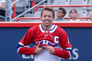 Daniel Nestor Wearing Sports Jersey Wallpaper