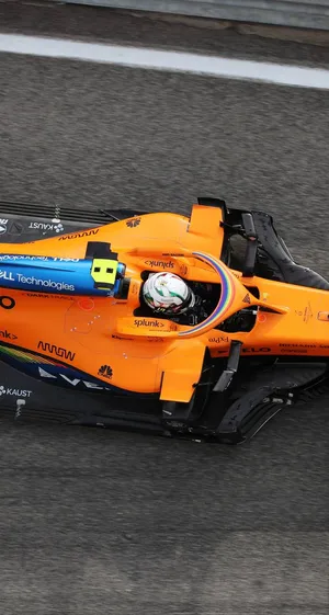 Daniel Ricciardo Dominating The Formula 1 Race Track From A Bird's Eye View. Wallpaper