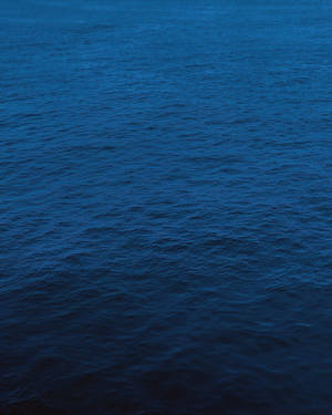 Dark Blue Background Calm Ocean Wave Wallpaper