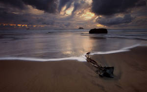 Dark Cloudy Beach Desktop Wallpaper