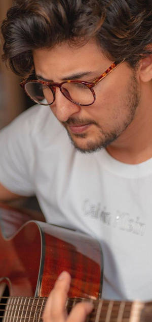 Darshan Raval Hd Playing Guitar Wallpaper