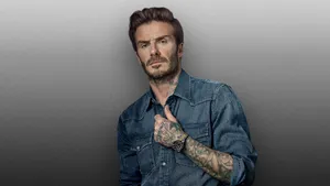David Beckham Rocks A Denim Shirt. Wallpaper
