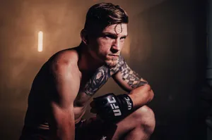 David Dvořák Kneeling Pose Wallpaper