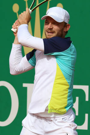 David Goffin In Action: Raising Racket Elegantly Wallpaper